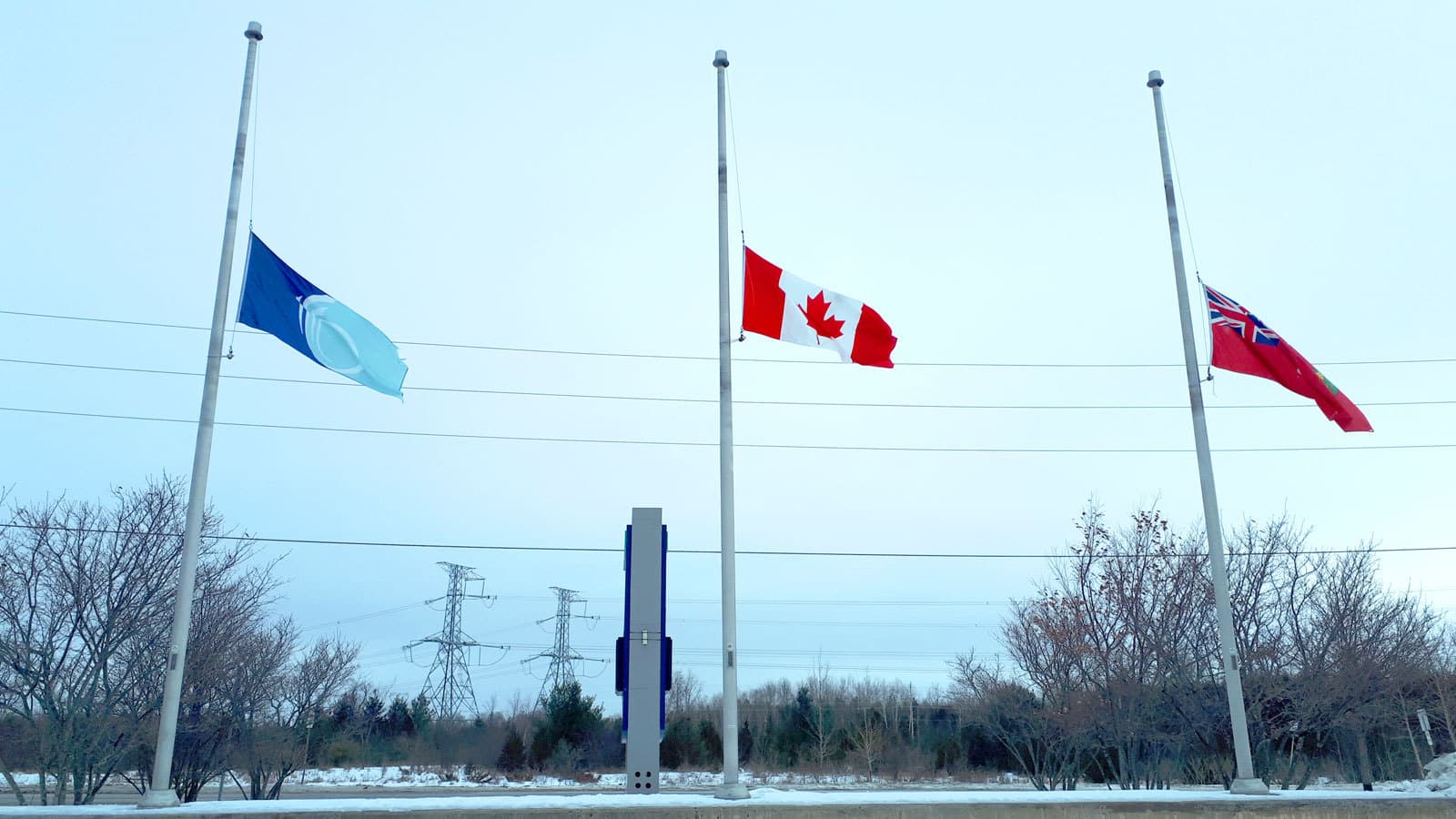 City flags lowered to halfmast to commemorate the National Day of
