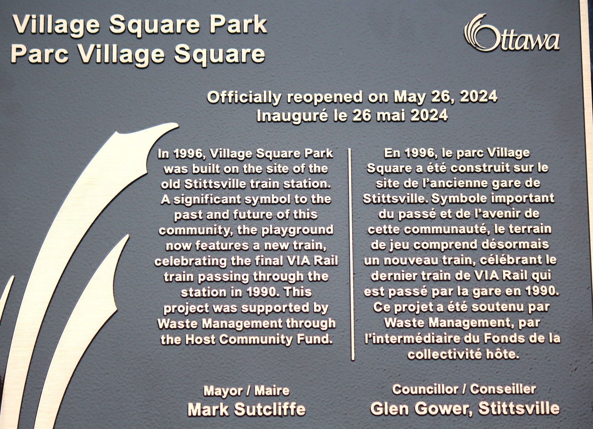 Plaque commemorating the re-opening of Village Square Park
